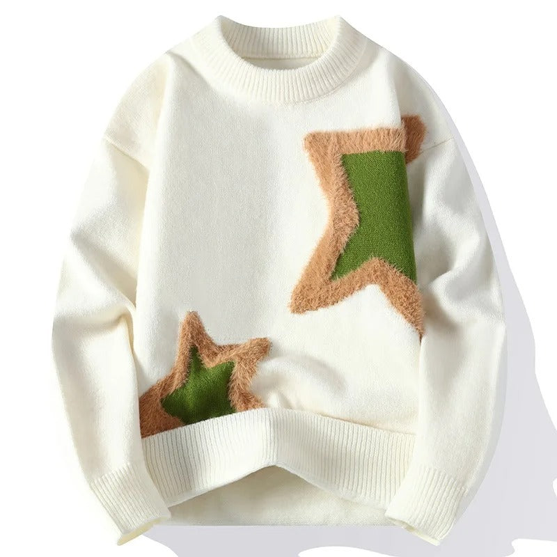 White sweater with green and brown star designs on a white background